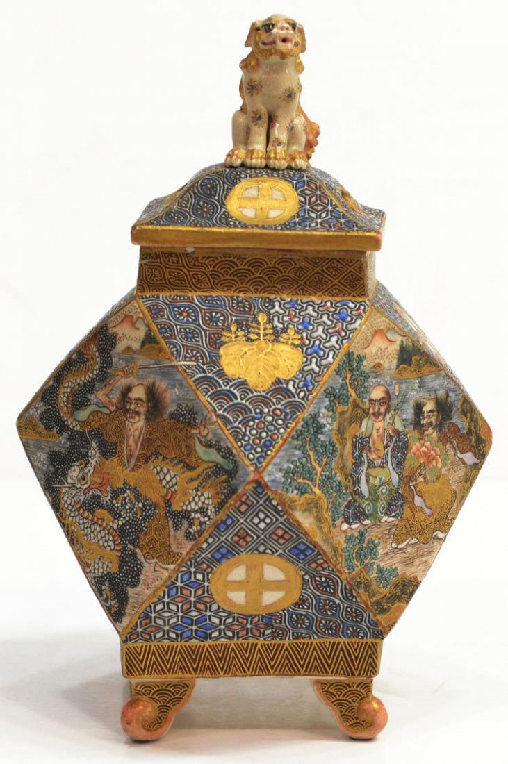 JAPANESE SATSUMA EARTHENWARE CENSER, MEIJI/TAISHO: Japanese Satsuma earthenware censer, Meiji/Taisho period, gilt and foliated karashihi (Chinese lion) finial set on a pierced lid, the faceted body with diamond form panels featuring Chinese immortals