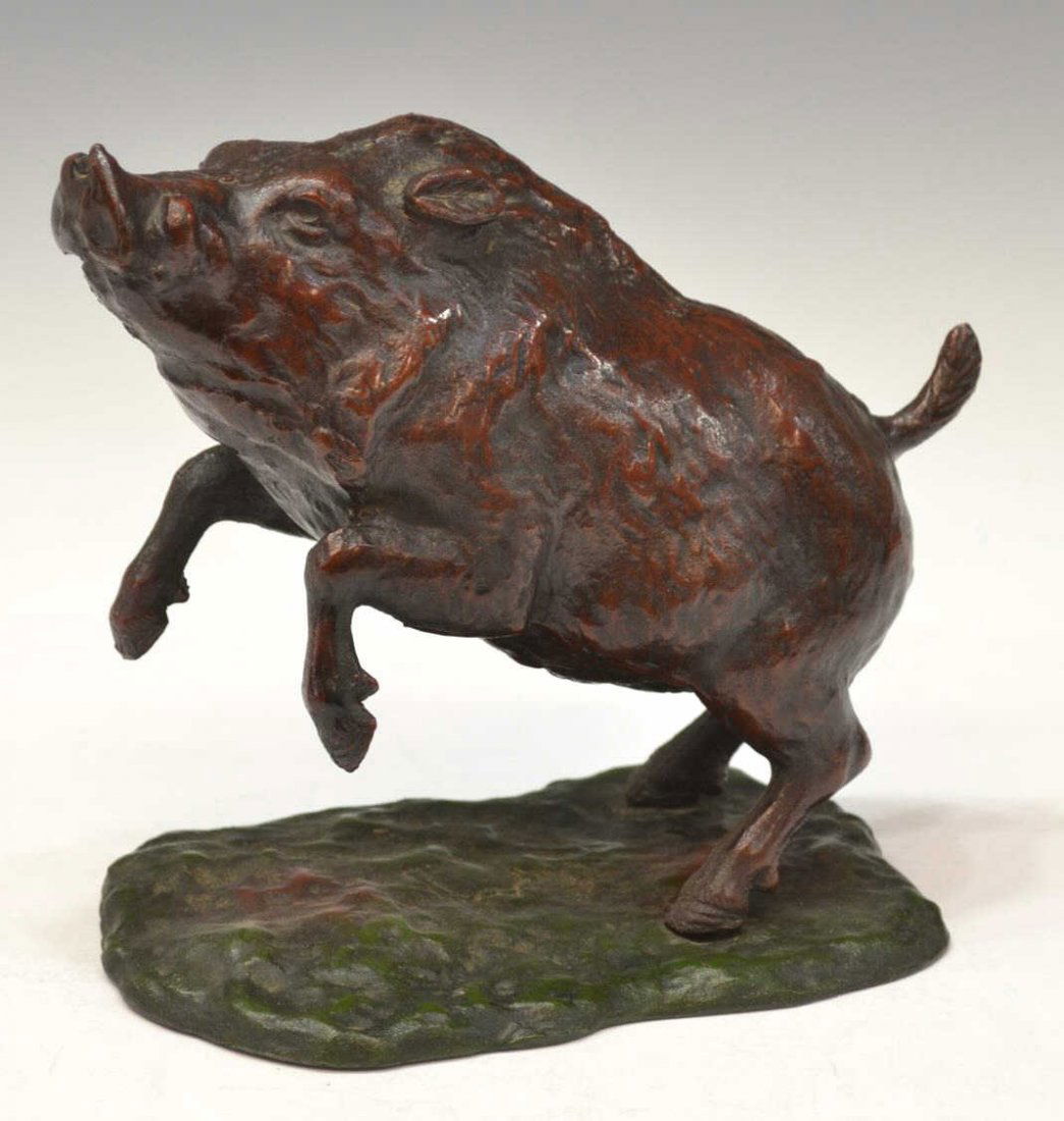 COLD PAINTED CAST IRON RAZORBACK BOAR SCULPTURE: Cold painted cast iron statue in the form of a leaping razorback boar, rising on iron base, 7.5"h, 9"l, 6lbs Start Price: $80.00