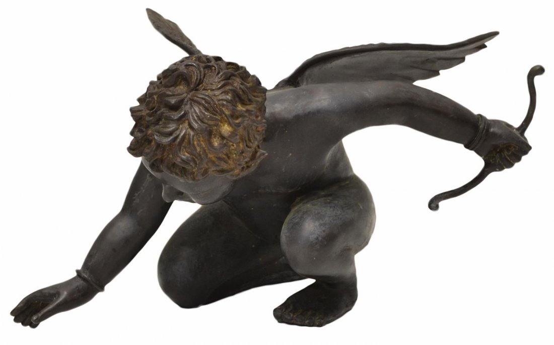 GARDEN BRONZE CUPID & BOW: Weathered garden bronze, a model of Cupid with bow, approx 15"h, 28"w (hand to hand), 20"d, 32.75lbs Start Price: $200.00