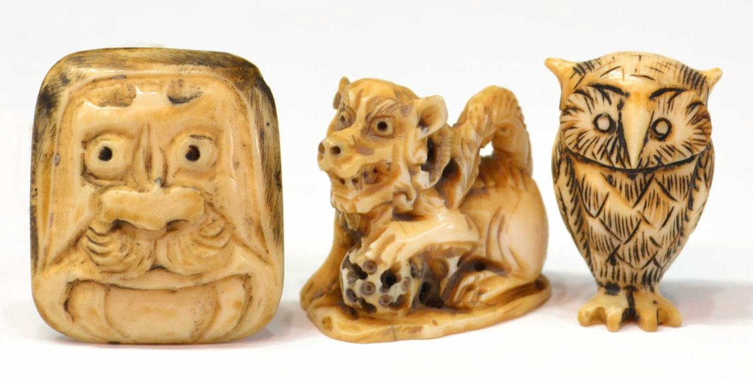 ASIAN CARVED IVORY NETUSKE FU LION, OWL, PLAQUE: *This lot will not be shipped Internationally* (lot of 3) Asian carved ivory netsuke, each signed as pictured, 20th c.: (1) figure of a fu lion with a ball, signed Tofu, 1.5"h; (1) owl, signed Tamakaz