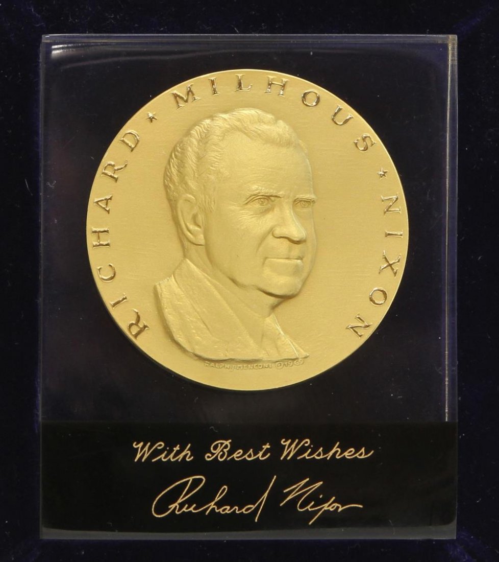 PRESIDENT RICHARD NIXON INAUGURAL MEDAL: President Richard Milhous Nixon inauguration medal encased in lucite, marked in gilt writing: "With Best Wishes, Richard Nixon", housed in original LGB Jewelry red hinged box with presidential seal at