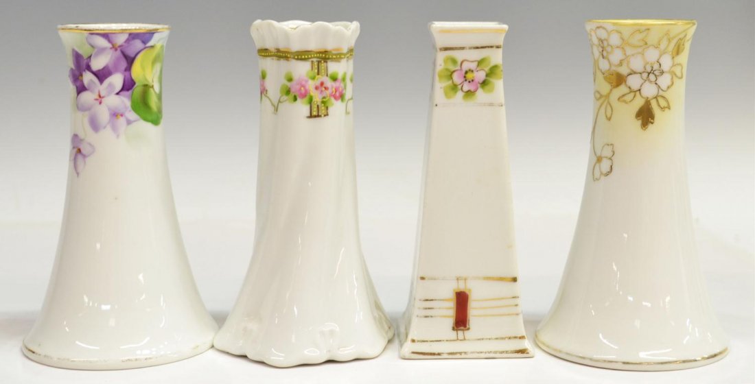 (4) NIPPON HAND PAINTED PORCELAIN HAT PIN HOLDERS: (lot of 4) Collection of hand painted porcelain Nippon hat pin holders, early 20th c., each decorated with a floral motif, some with gilt accents and enameling, of varying shapes, overall some paint l