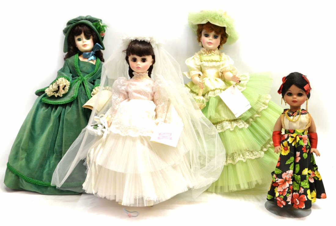 (4) COLLECTION OF MADAME ALEXANDER DOLLS: (lot of 4) Madame Alexander dolls, including: 'Scarlet', 'Elise' in original box, 'Morisot', lacking shoes, all retaining tags, together with a Hawaiian styled doll on stand, smallest: 14"h, largest: 