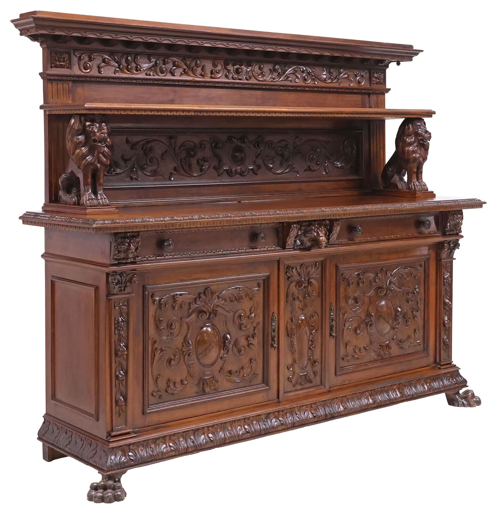 ITALIAN RENAISSANCE REVIVAL CARVED WALNUT LIONS SIDEBOARD: Italian Renaissance Revival carved walnut buffet/ server, 19th c., having molded cornice, over paneled back with foliated scrollwork, single shelf raised on seated lion supports, lower case fitted wit