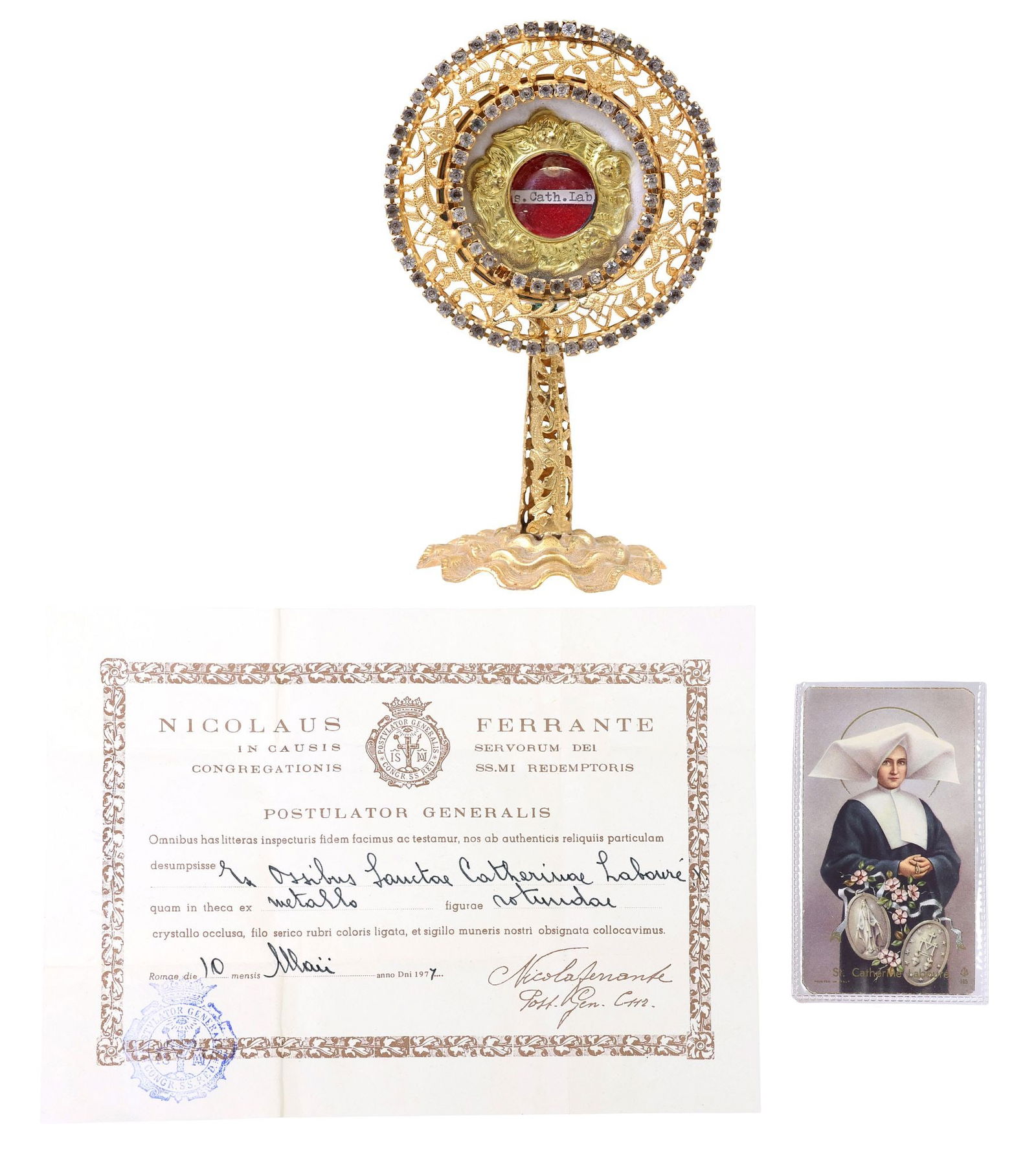 1ST-CLASS RELIC OF ST. CATHERINE LABOURE IN ALTAR RELIQUARY WITH COA: Religious first-class (ex ossibus) relic of Saint Catherine Laboure (French, 1806-1876), housed in a gold-tone metal theca reliquary, with repousse cherub masks, red wax seal with the Congregation of
