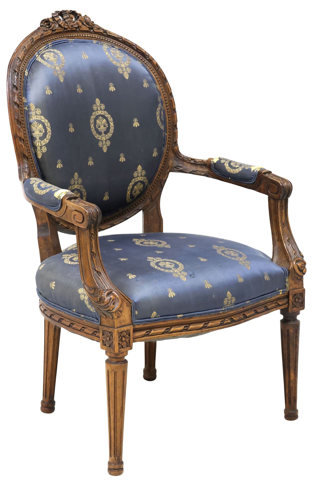 FRENCH LOUIS XVI STYLE SILK UPHOLSTERED FAUTEUIL ARMCHAIR: French Louis XVI style fauteuil/ armchair, 20th c., having foliate bow crest, over oval back seat, with molded ribbon-twist beaded trim, upholstered in blue silk fabric with golden bees and foliate fo