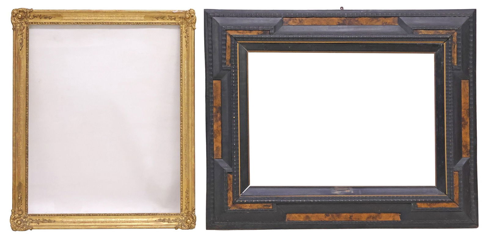 (2) CONTINENTAL EBONIZED & GILTWOOD PICTURE FRAMES: (lot of 2) Continental picture frames, 19th c., including: (1) ebonized and ripple molded frame, likely Flemish or Dutch, with marbleized paneling, sight: approx 20"h, 28"w, rabbet: approx 20.5"h, 28.
