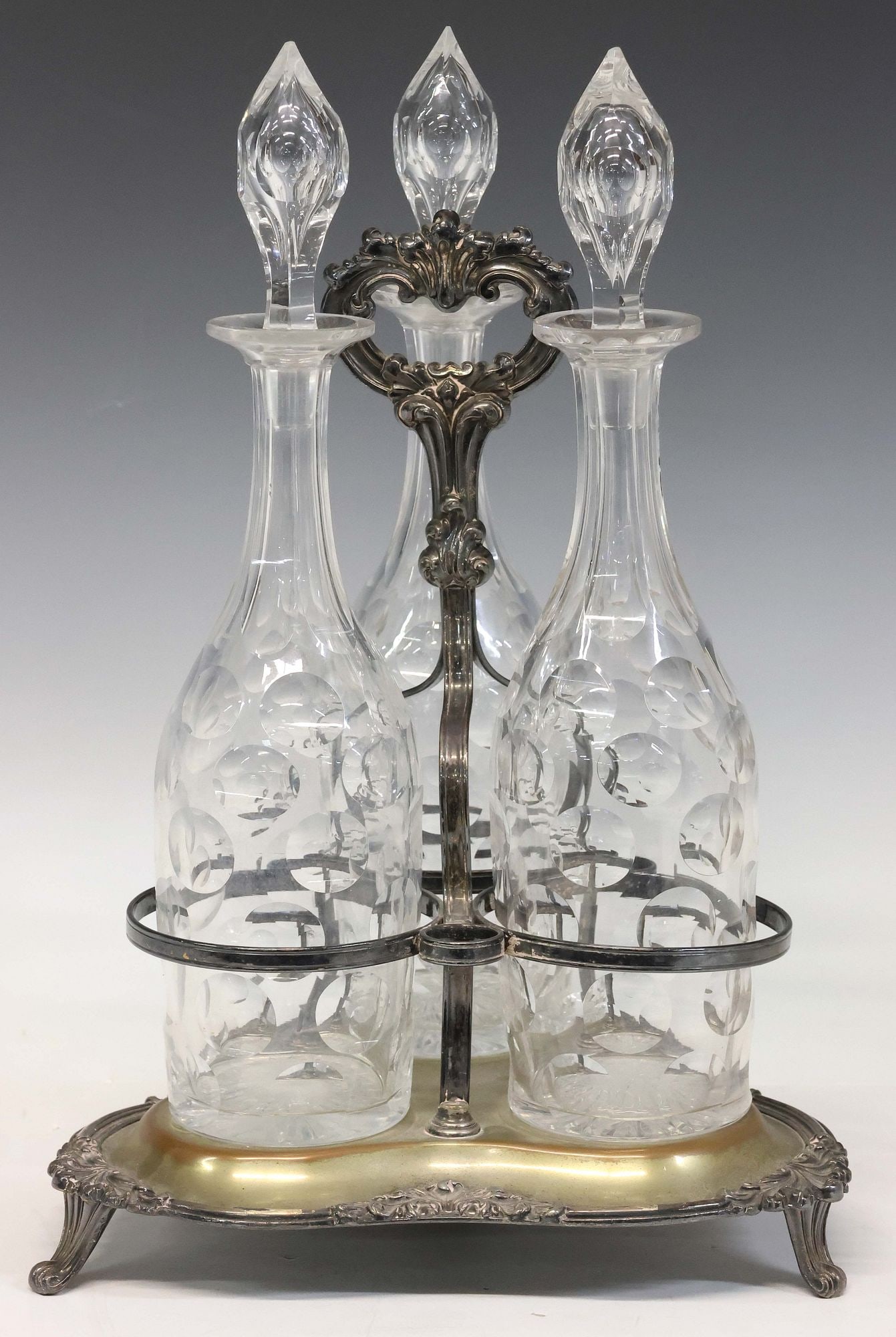 CUT GLASS DECANTERS IN SILVERPLATE STAND (1 of 3)