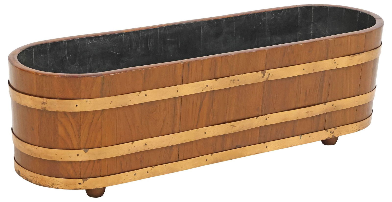 ENGLISH COPPER-BOUND MAHOGANY OVAL PLANTER, 41"W: English mahogany planter/ jardiniere, early 20th c., stave construction, with three copper bands, removable metal liner, on bun feet, approx 13"h, 41"w, 12.5"d