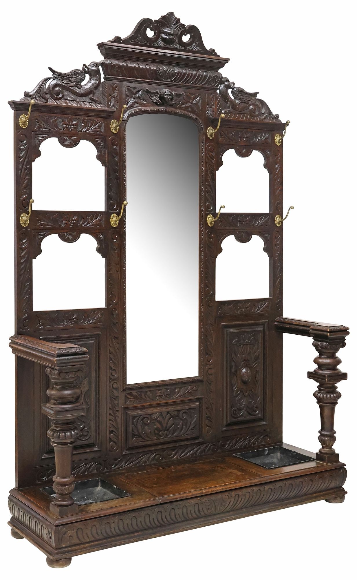 LARGE ENGLISH VICTORIAN FIGURAL CARVED HALLSTAND: English Victorian carved oak hall stand, 19th c., having scrolled crest with central lion mask, flanked by mythical hybrid beasts, backboard heavily carved with foliated scrollwork and grotesque