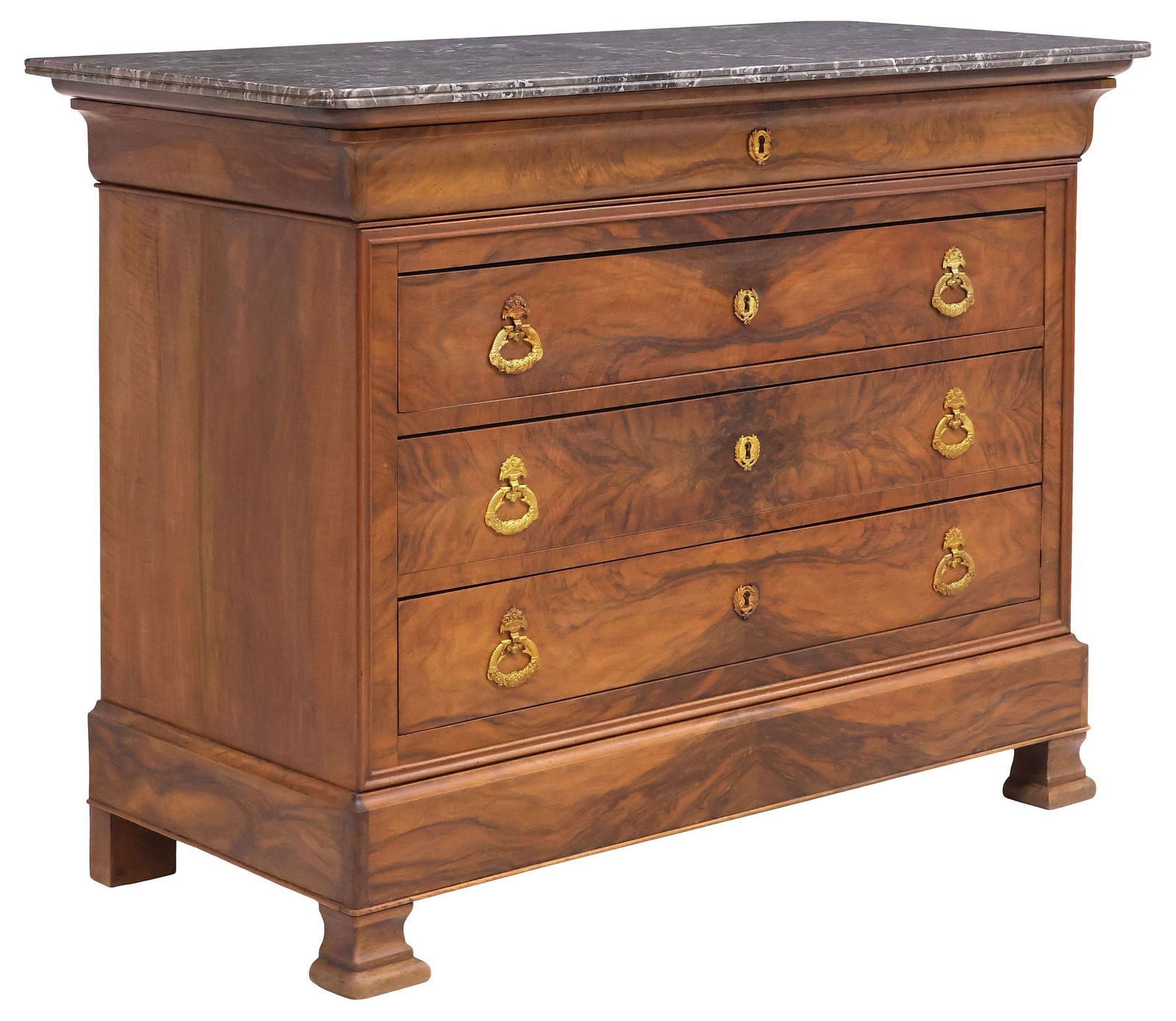 FRENCH LOUIS PHILIPPE PERIOD MARBLE-TOP WALNUT COMMODE: French Louis Philippe figured walnut commode, mid 19th c., having molded-edge marble top, over protruding frieze drawer, and three long drawers equipped with gilt-metal cornucopia-form handles, rising
