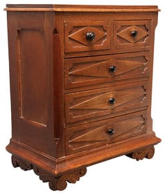 ENGLISH CARVED TABLE-TOP CHEST OF DRAWERS