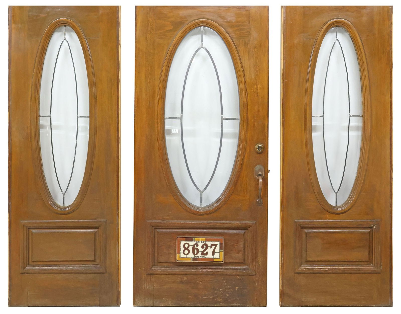(3) ARCHITECTURAL GLASS & WOOD ENTRYWAY SET, DOORS & WINDOWS, 80"H: (lot of 3) Large architectural paneled wood entryway suite, 20th c., comprised of a door and two side windows, each having central leaded oval frame, with colorless beveled glass panels, including: (p