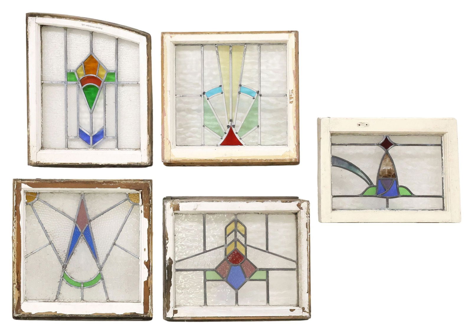(5) ENGLISH ARCHITECTURAL STAINED & LEADED GLASS WINDOWS: (lot of 5) English architectural stained and leaded glass windows, early 20th c., white painted wood frames, encasing textured clear and multicolored glass panels, forming various geometric motifs, la