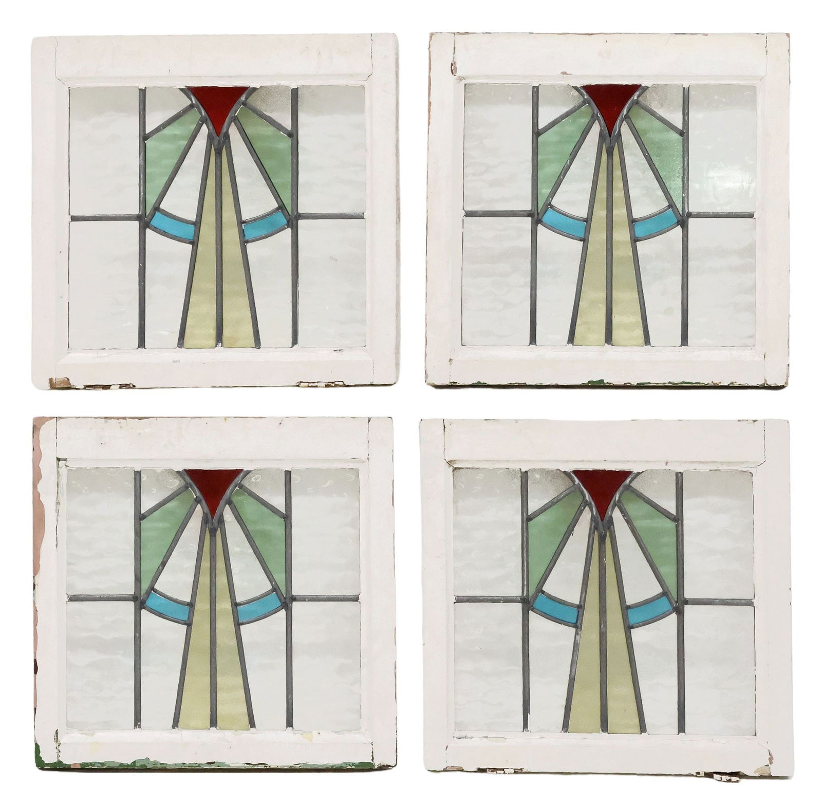 (4) ENGLISH ARCHITECTURAL STAINED & LEADED GLASS WINDOWS: (lot of 4) English architectural stained and leaded glass windows, early 20th c., white painted wood frames, encasing textured clear and multicolored glass panels, forming fan/ ray of light geometric