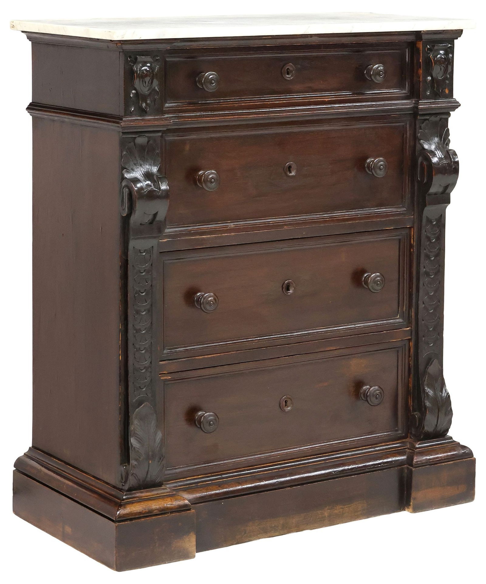 ITALIAN RENAISSANCE REVIVAL MARBLE-TOP WALNUT COMMODE: Italian Renaissance Revival carved walnut commode, 19th c., having rectangular marble top, above four drawers, flanked by scrolled corner posts with foliate caps, two carved shield motifs with respect