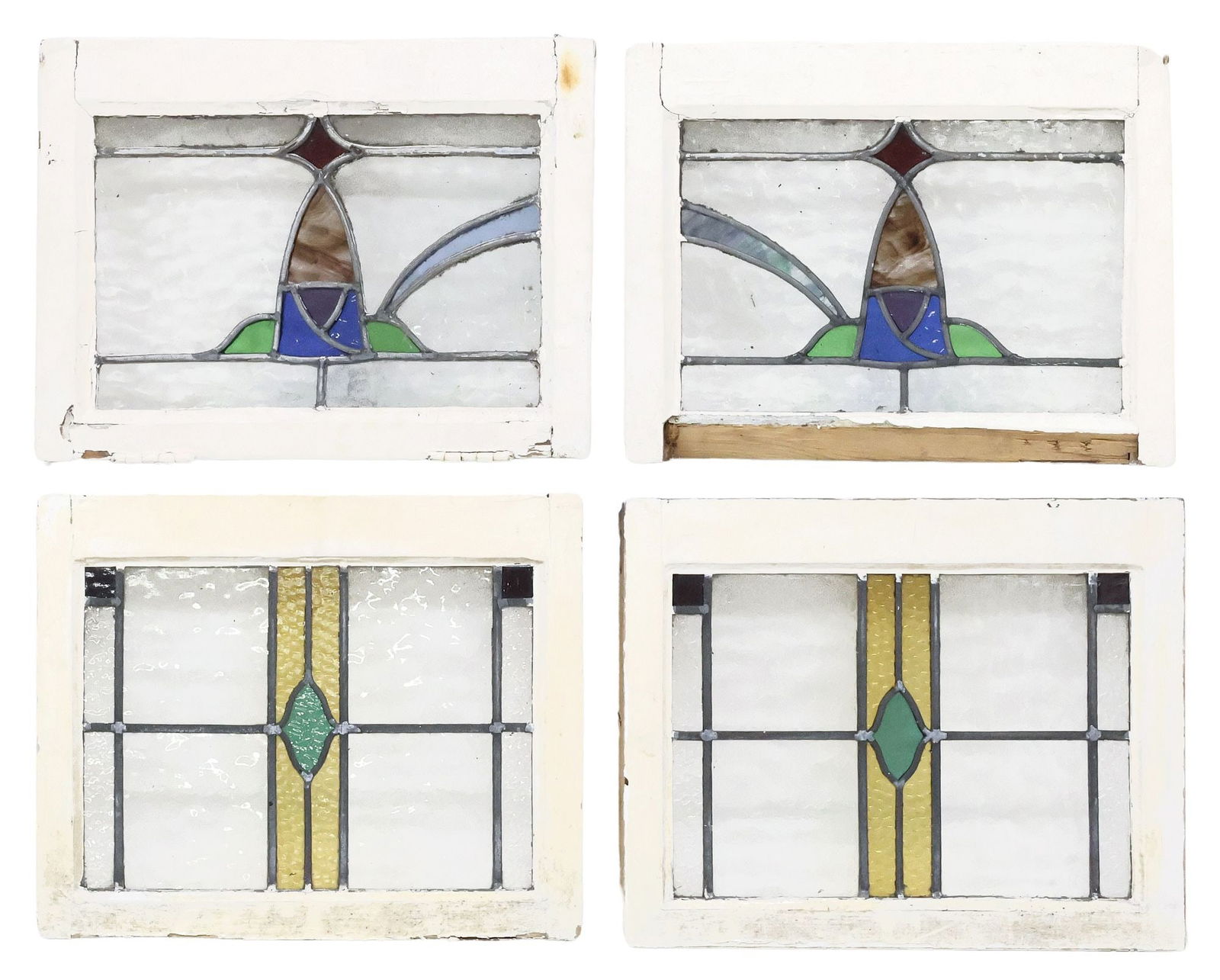 (4) ENGLISH ARCHITECTURAL STAINED & LEADED GLASS WINDOWS: (lot of 4) English architectural stained and leaded glass windows, early 20th c., white painted wood frames, encasing textured clear and multicolored glass panels, forming oval and geometric designs,