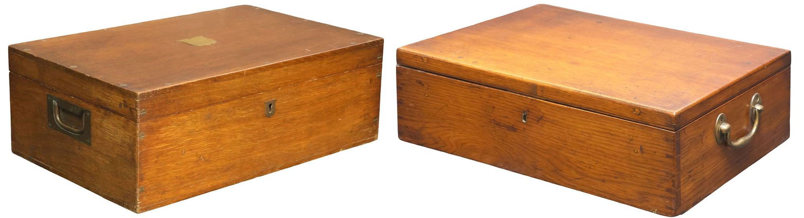 (2) ENGLISH LATE VICTORIAN OAK STORAGE / WORK BOXES: (lot of 2) Large English oak storage boxes, late 19th/ early 20th c., including: (1) with lid displaying vacant shield-form cartouche, over inset brass handles and escutcheon, opening to remnants of l