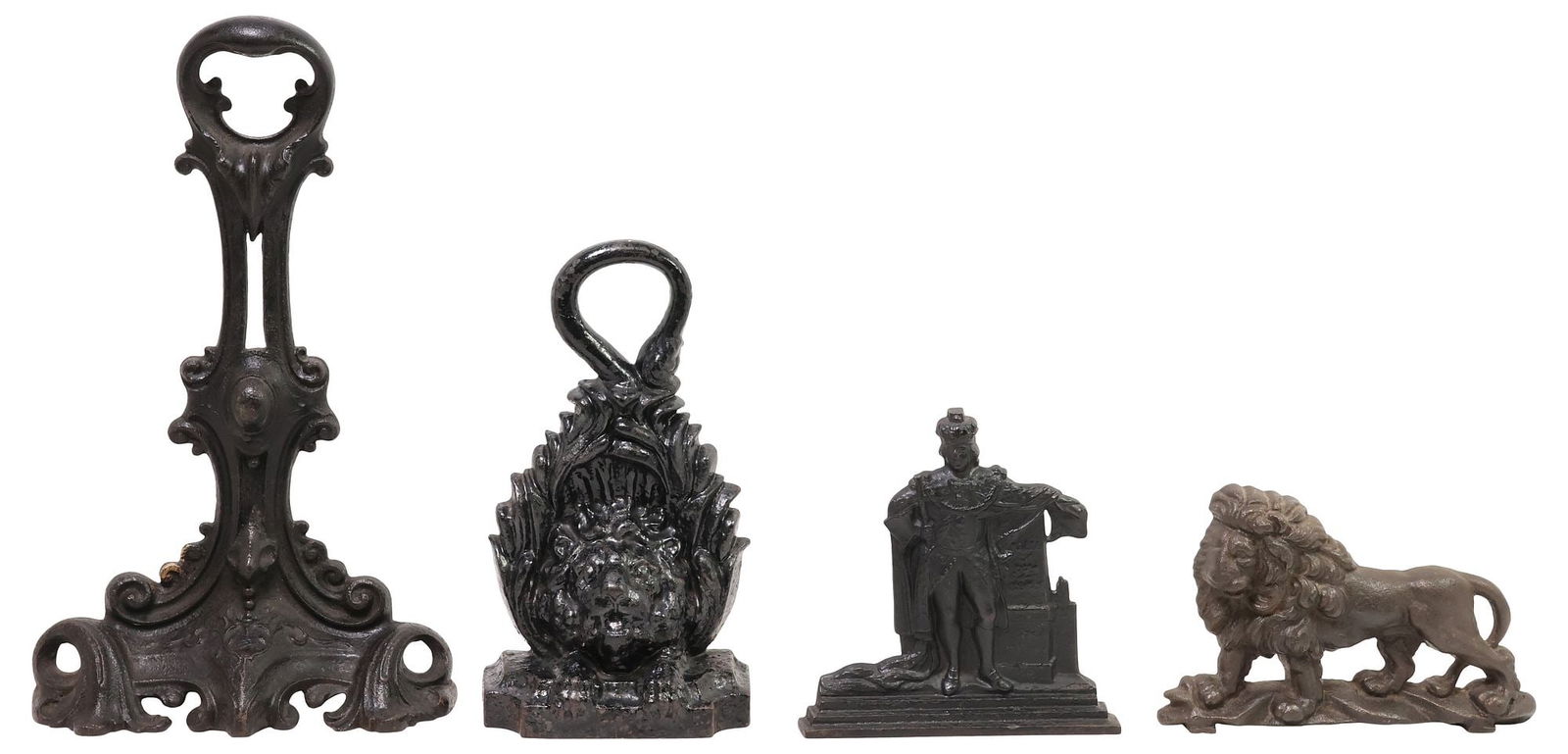 (4) ENGLISH CAST IRON FIGURAL & DECORATIVE DOOR PORTERS: (lot of 4) English cast iron door stops, 20th c., of various size and shape, (2) lion-form, (1) King George III in coronation robes, beside a plinth inscribed "Bill of Rights" and "Magna Charta," (1)