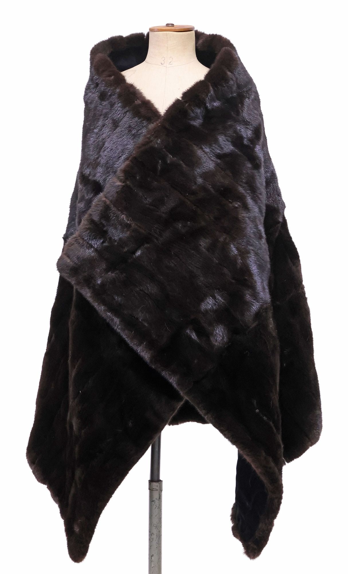 LADIES BROWN MINK FUR SHAWL WRAP: Ladies chocolate brown mink fur wrap or shawl, with channeled tufting, interior lined in a black ribbed velvet, approx 56"l, 30"w, 2.75lbs