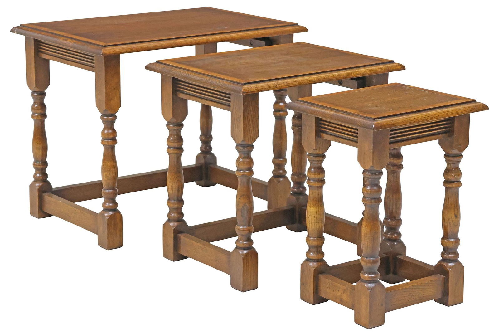 (3) ENGLISH INLAID OAK NESTING TABLES: (lot of 3) English inlaid oak nesting tables, 20th c., each having rectangular top with banded trim, and reeded apron, rising on turned legs, ending on stretcher-joined block feet, largest: approx 18.