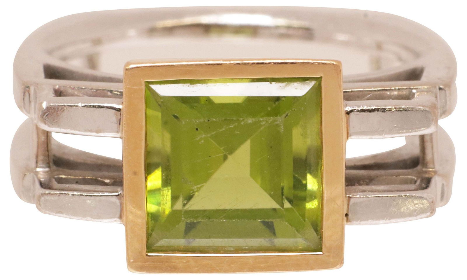 ESTATE DESIGNER MICHAEL ALEXANDER 18KT GOLD & 3.00 CT PERIDOT RING: Estate designer 18kt two-tone gold ring, Michael Alexander, central square step-cut period, approx 3.00ct, within a rose gold bezel, architectural openwork white gold palladium (coated) shank with rai