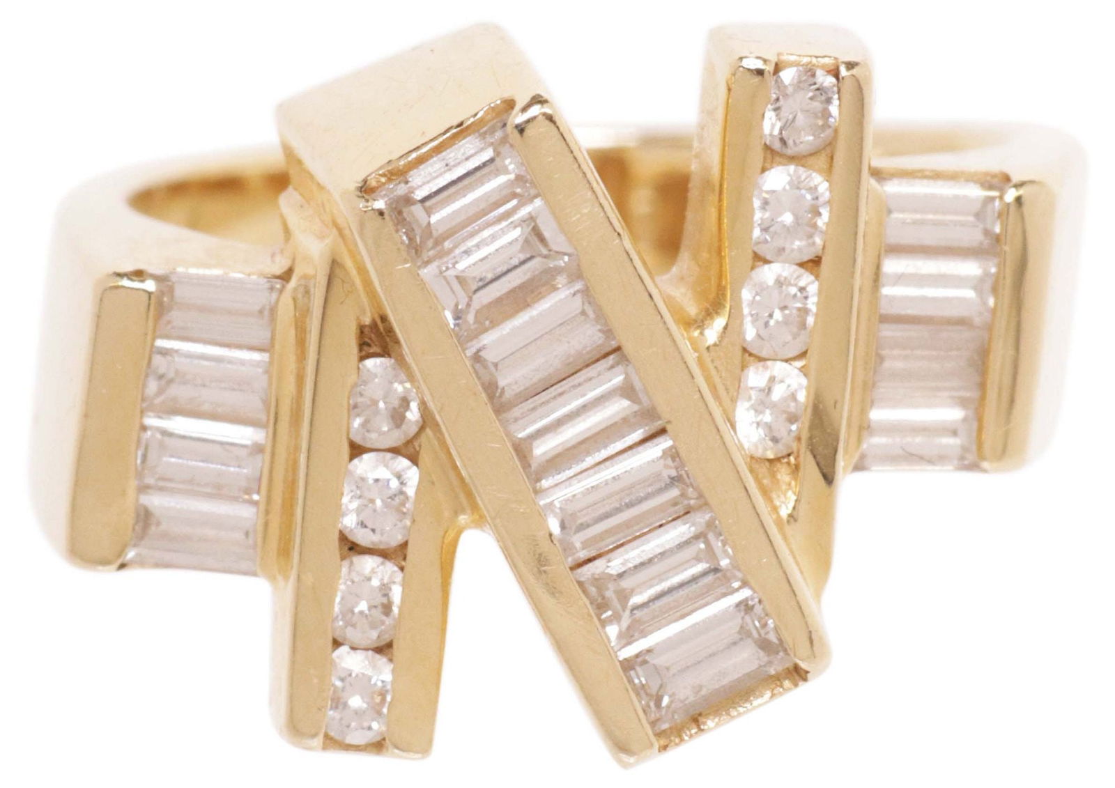 ESTATE DESIGNER JOAN MICHLIN NEW YORK 14KT YELLOW GOLD & DIAMOND RING: Estate designer 14kt yellow gold and diamond "Millenium" ring, a limited edition designed by Joan Michlin, New York, comprising (fifteen) varied baguette diamonds, and (eight) roun
