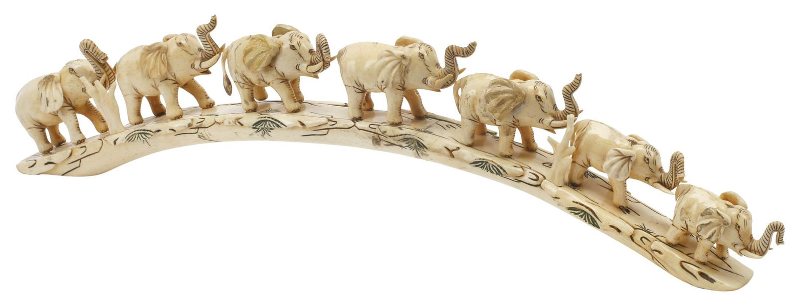 CHINESE CARVED BONE SCULPTURE, ELEPHANTS ON BRIDGE: Chinese carved bone sculpture, depicting seven elephants spanning an arched bridge, intact with restoration to elephants' ears and trunks, three later sculpted composite ears, approx 5.5"h, 25.5"w,