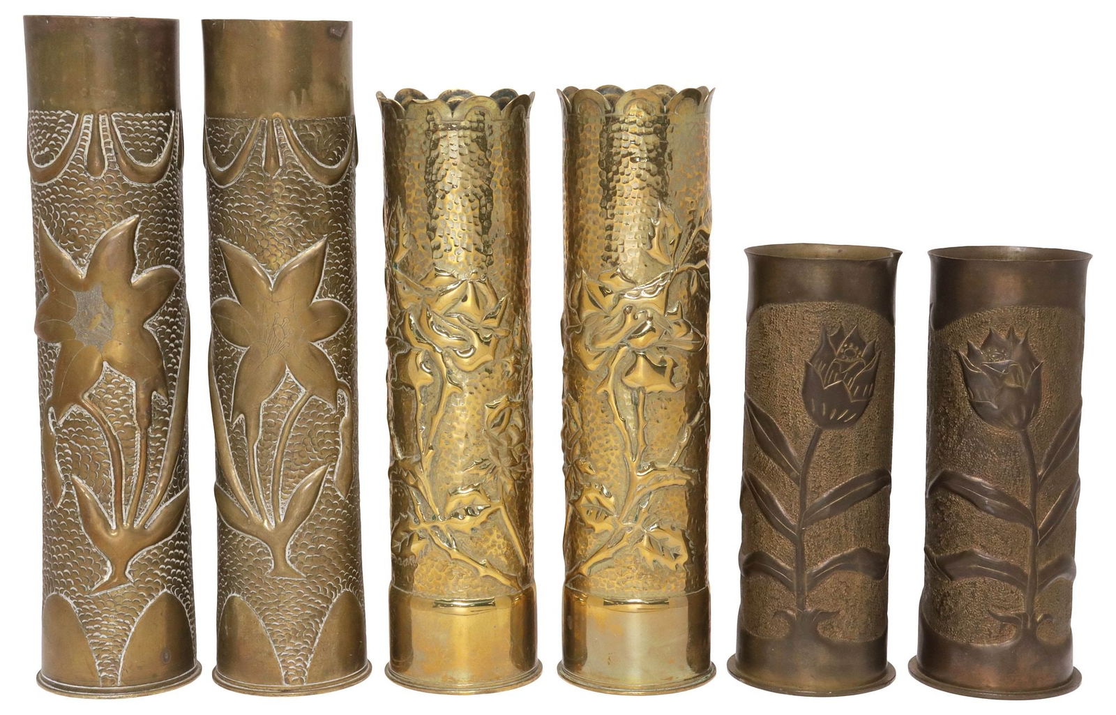 (6) FRENCH WWI-ERA TRENCH ART ARTILLERY SHELL VASES: (lot of 6) French WWI-era trench art vases, fashioned from artillery shells, including: (pair) with dotted ground and central repousse lily flower, (pair) with scalloped rim and dotted ground,