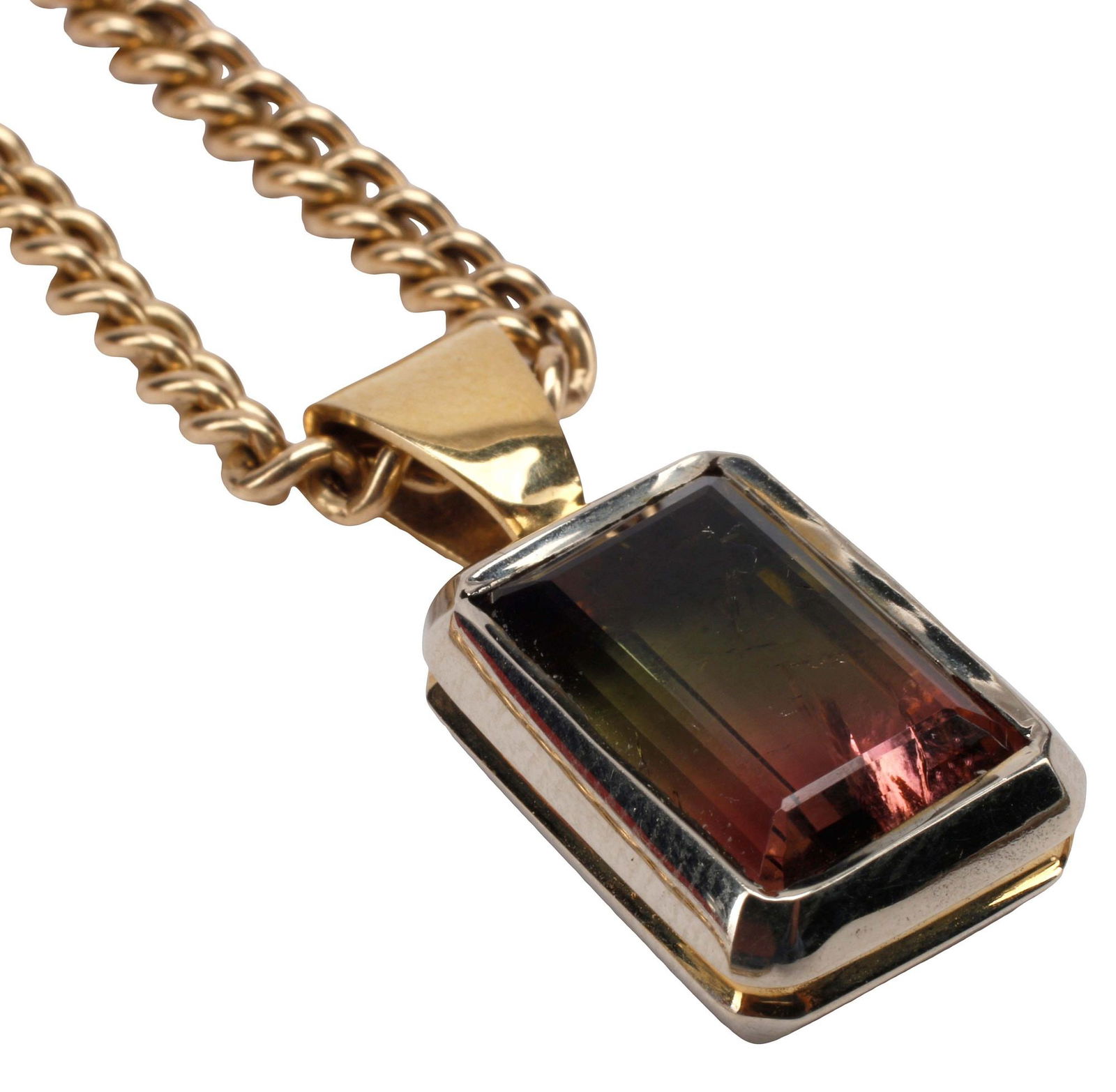 ESTATE 14KT GOLD BEZEL-SET BI-COLORED TOURMALINE PENDANT NECKLACE: Estate 14kt yellow gold pendant necklace, featuring: a bezel-set parti or bi-colored green-to-pink tourmaline, approx 8.00ct, approx 1 1/16"l, .5"w; on an Italian 14kt yellow gold chain, lobster claw
