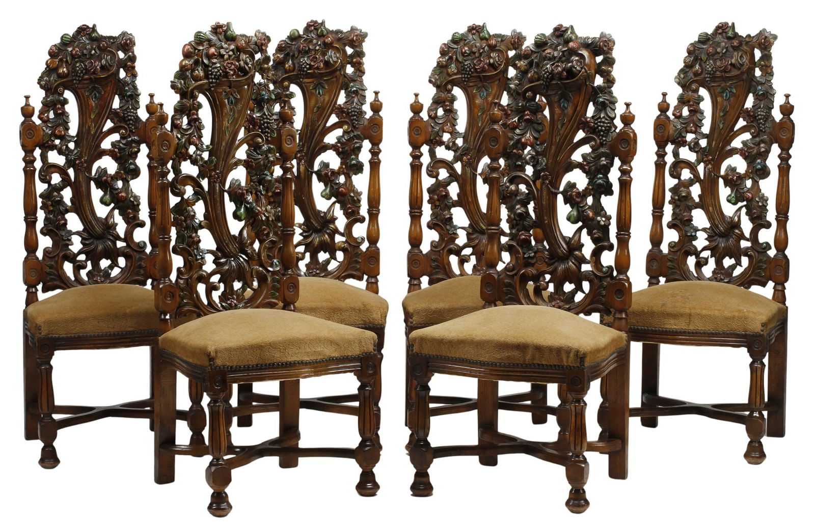 (6) SPANISH STYLE CARVED & PAINTED CORNUCOPIA DINING CHAIRS: (lot of 6) Spanish style carved and polychrome painted wood side chairs, each having pierced back with fruit-filled cornucopia, among grape clusters and foliate motifs, padded seat in tan upholstery,