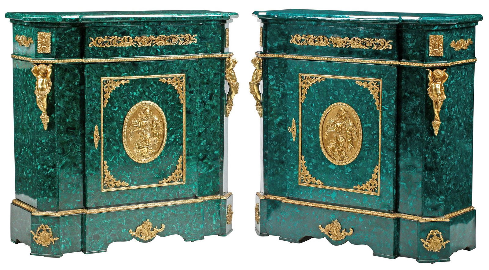 (2) NAPOLEON III STYLE ORMOLU-MOUNTED & MALACHITE-VENEERED CABINETS: (pair) Napoleon III style malachite-veneered cabinets, in slightly varied finishes, each with bronze dore mounts, shaped case fitted with single drawer, door central oval relief plaque depicting winge