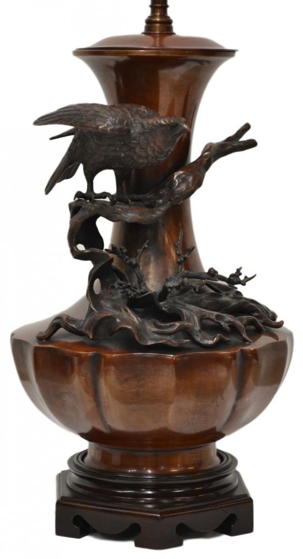 JAPANESE PATINATED BRONZE VASIFORM BIRD LAMP: Large Japanese patinated bronze vasiform lamp , having an applied bird perched upon a gnarled branch, wood base with repair to one leg, 37lbs Start Price: $200.00