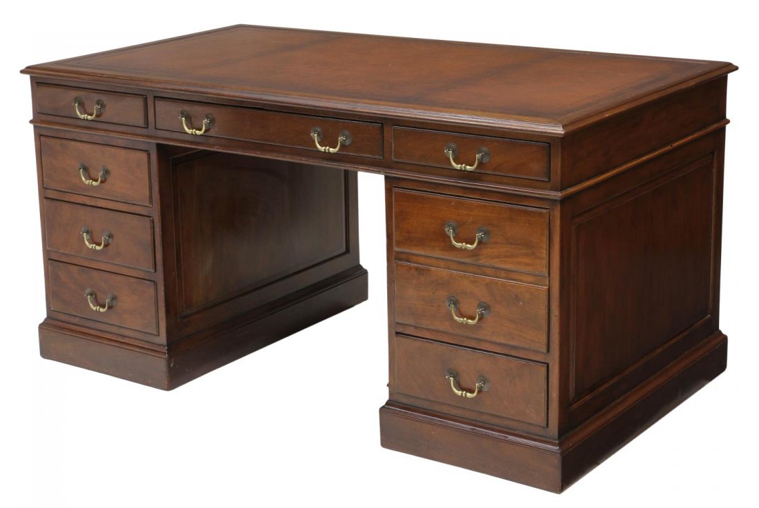 LARGE KITTINGER MAHOGANY & LEATHER EXECUTIVE DESK: American mahogany eight drawer executive desk, Kittinger Furniture Company, Buffalo, New York, the large rectangular top inset with embossed leather writing surface, central drawer above the knee hole