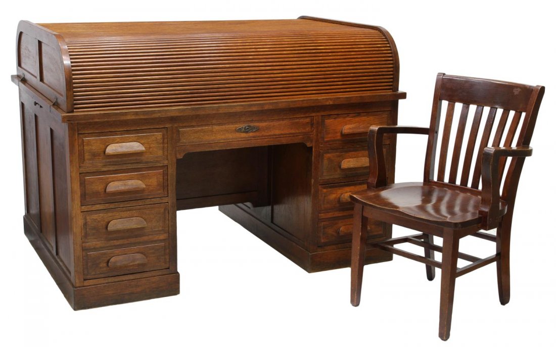 OAK TAMBOUR TOP PARTNERS DESK, JEAN MARIE GLOPPE: (lot of 2) A scarce American oak partners desk, by Jean Marie Gloppe, late 19th c., the cylinder tambour top with a winding mechanism and drop down ends supported on slides, central drawer and kneehol