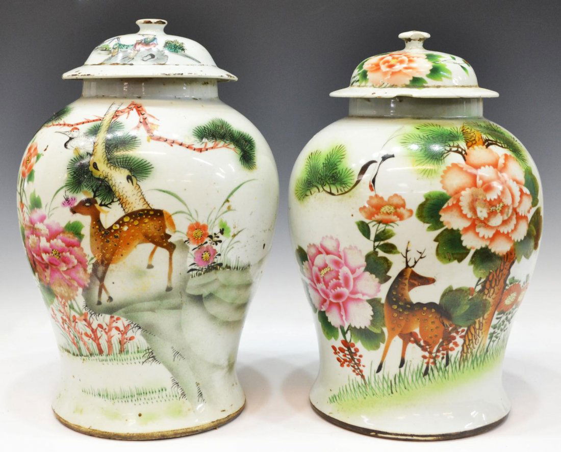 (2) CHINESE ENAMELED PORCELAIN COVERED JARS: (lot of 2) Chinese porcelain covered jars, each of baluster form, decorated with stag and other birds in a lush nature scene with large budding flowers, characters verso, one lid with figural decorati