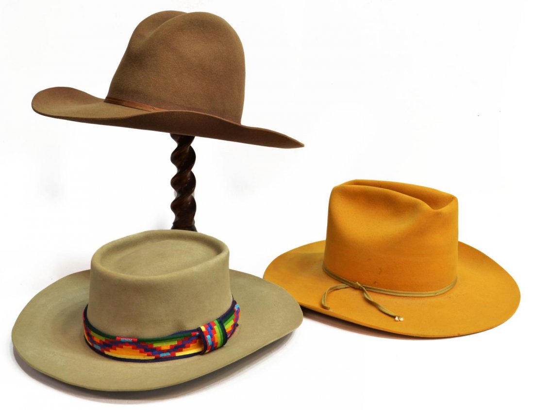 (3) WESTERN COWBOY HATS, TEXAS: (lot of 3) Western cowboy hats: (1) American Hat Company retailed by Don's Western Wear, Houston, Texas, size 7.1/4; (1) Bailey Hat Company, Texas, 5X, retailed by The Fair, Lott, Texas; (1) Bailey Ha