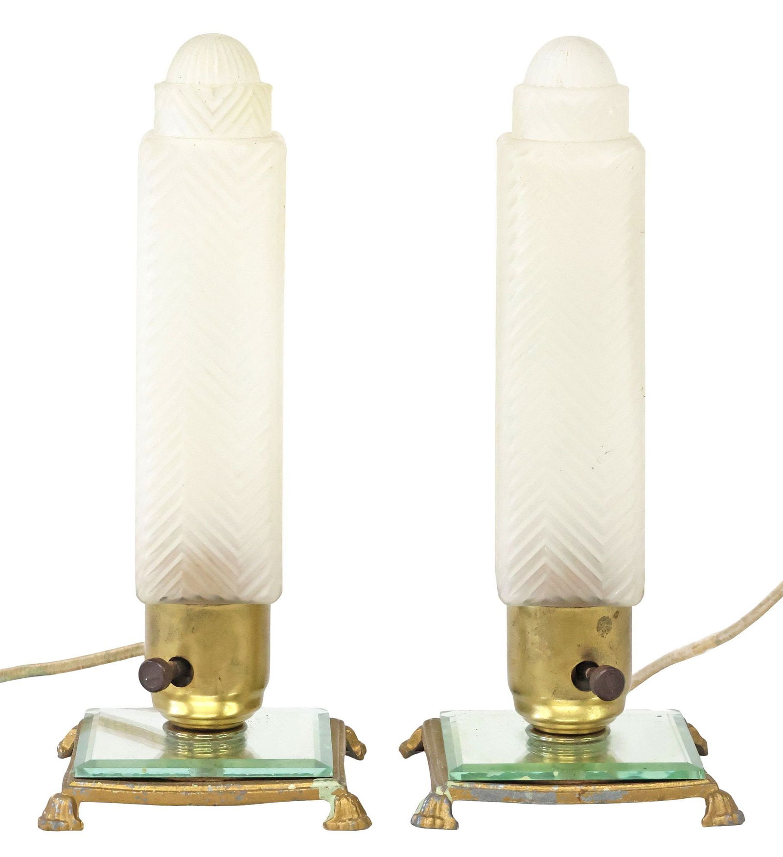 (2) ART DECO FROSTED & MOLDED GLASS SKYSCRAPER TABLE LAMPS: (pair) Art Deco period frosted glass and gilt-metal boudoir/ vanity lamps, c.1930s, each having molded shade, with ribbed dome top, over squared columnar body with chevron motif, concealing a single
