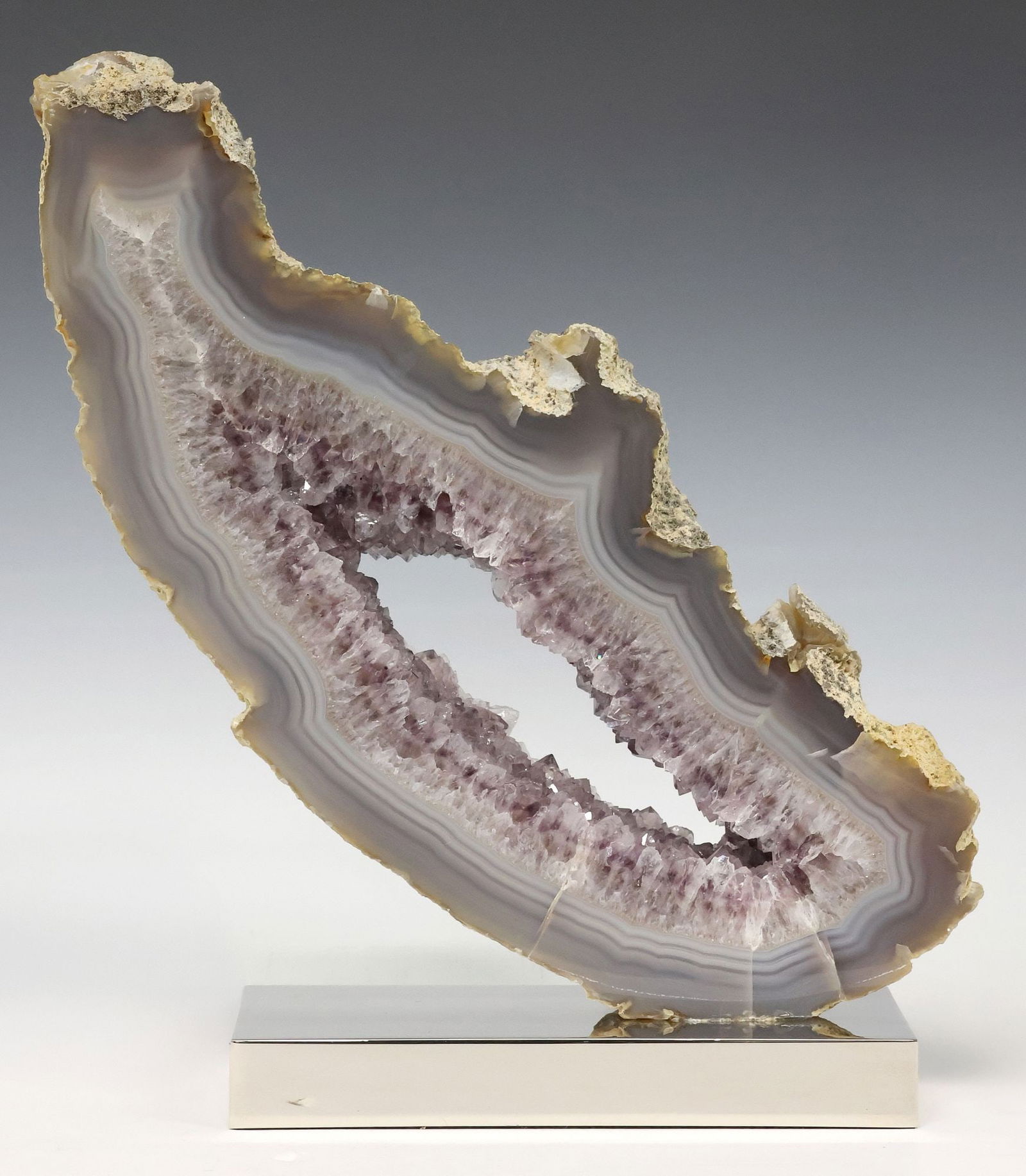 LARGE GEOLOGICAL AGATE GEODE SPECIMEN ON POLISHED NICKEL BASE (1 of 3)