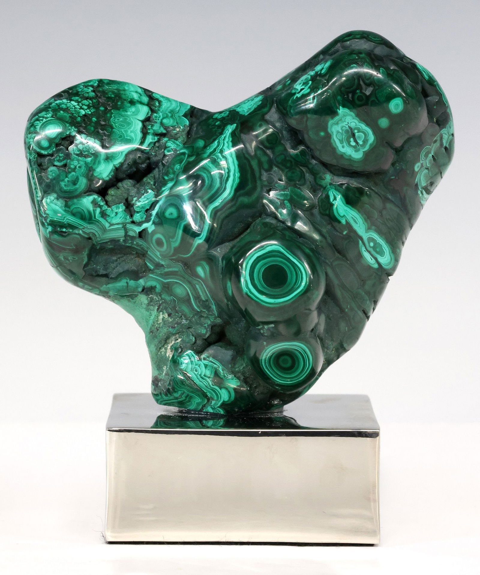 GEOLOGICAL MALACHITE SPECIMEN ON POLISHED NICKEL BASE: Geological malachite specimen, rising on polished nickel base, specimen: approx 4.5"h, 5"w, 2.25"d, overall: approx 5.75"h, 5"w, 3"d, 5.25lbs