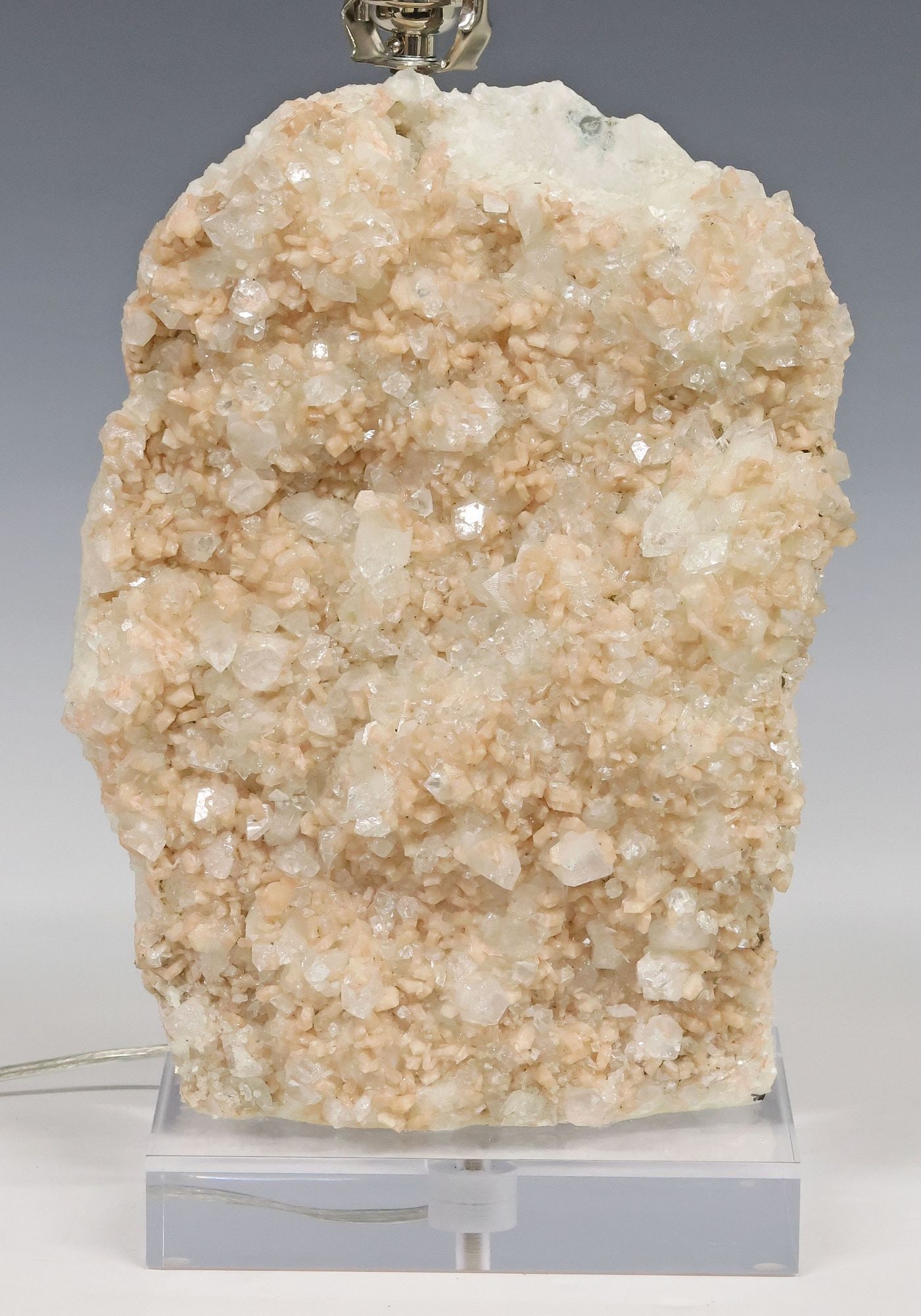 GEOLOGICAL APOPHYLLITE SPECIMEN 1-LT TABLE LAMP ON ACRYLIC BASE: Geological apophyllite cluster, now fashioned as a single-light table lamp, with dimmer dial, rising on colorless acrylic base, accompanied by fabric shade, observed operating, specimen: approx 13.5"h