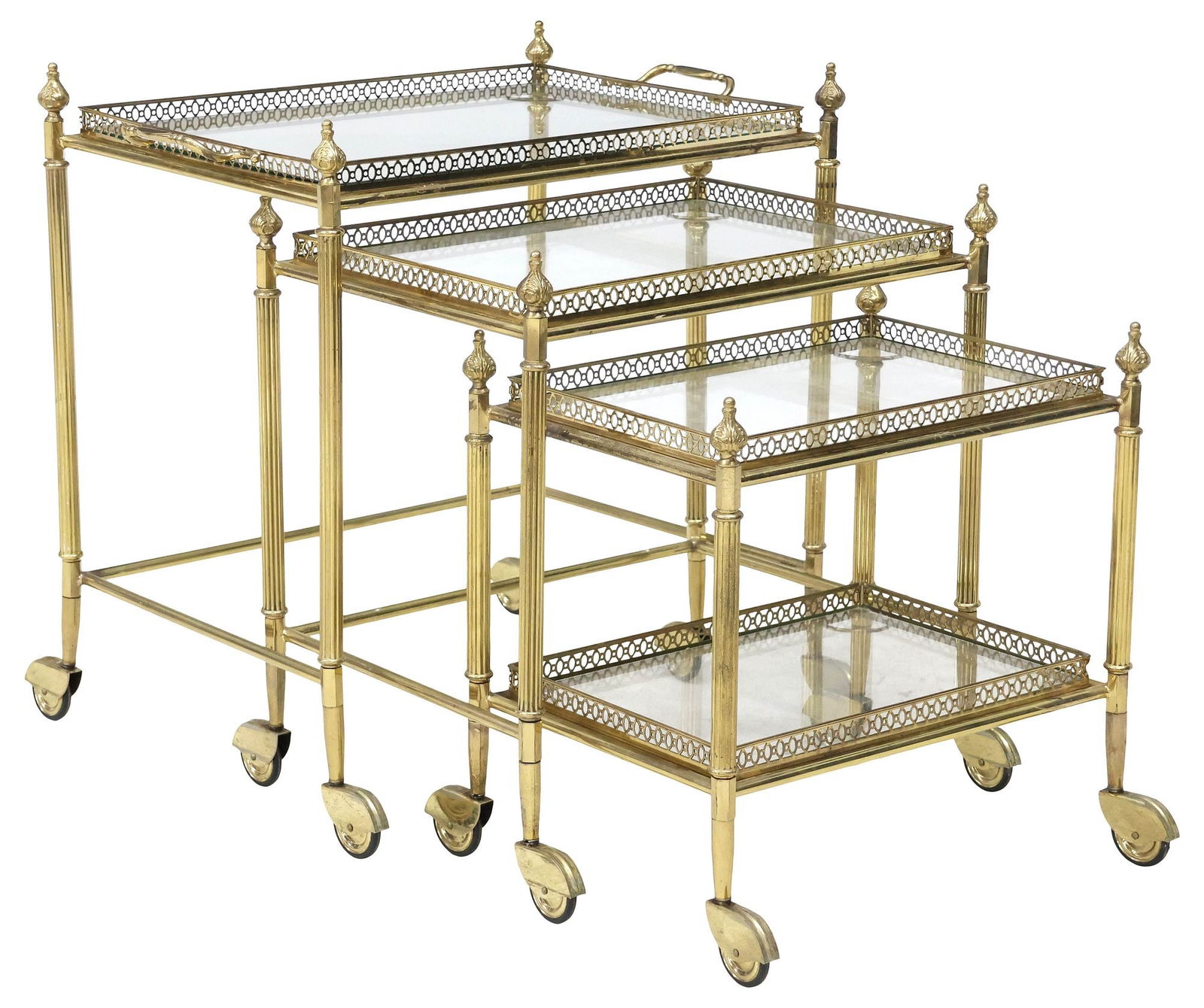 (3) FRENCH GILT-METAL & GLASS TRAY-TOP NESTING TABLES: (lot of 3) French gilt-metal and glass tray-top nesting tables, 20th c., each having removable rectangular top with pierced gallery and pointed finials, on conforming frame, ending on casters, largest