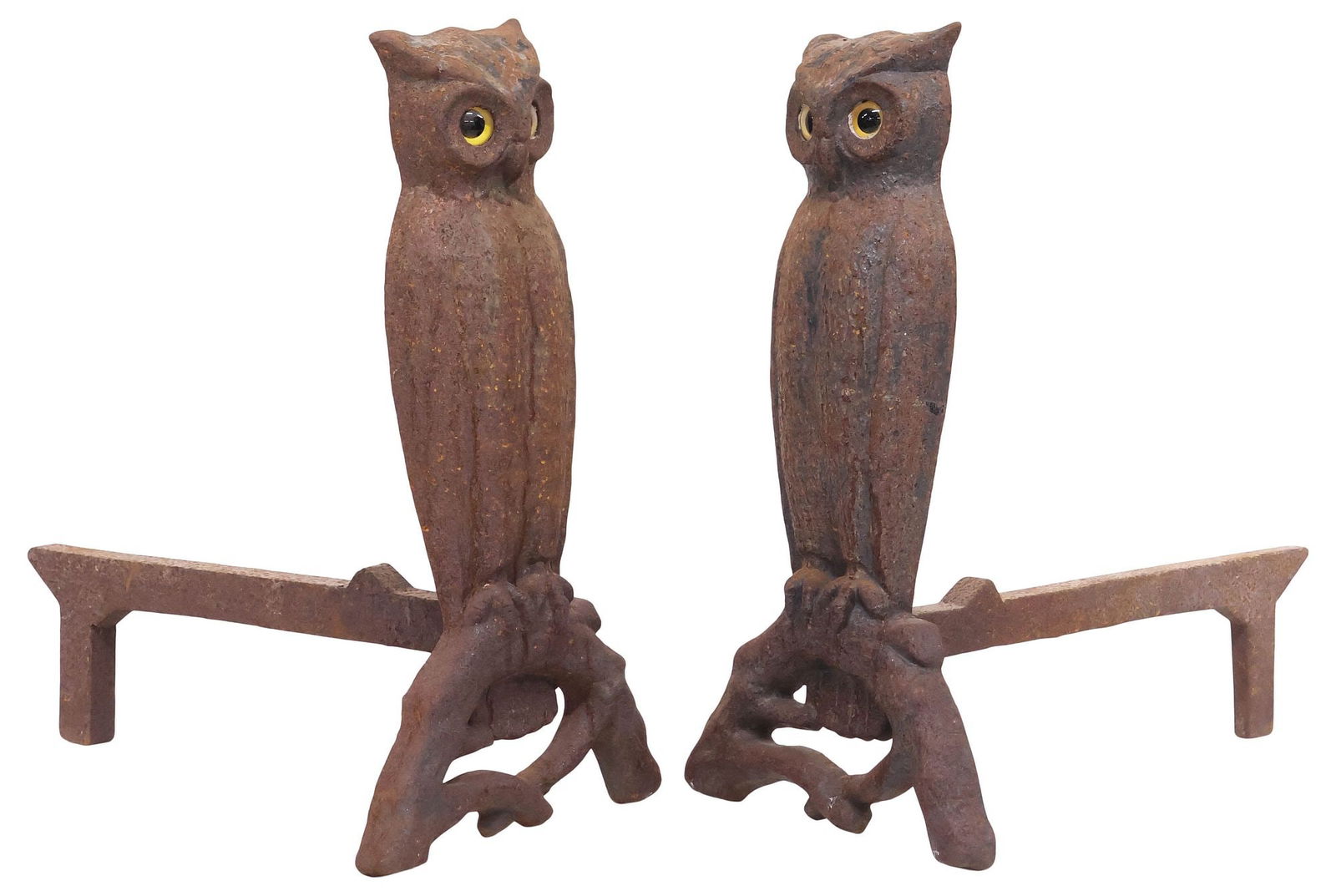 (2) LARGE CAST IRON FIGURAL OWL ANDIRONS WITH GLASS EYES, 22"H: (pair) Large cast iron figural fireplace andirons, each in the form of a seated owl, with inset yellow glass eyes, approx 22"h, 11"w, 19.5"d **Provenance: the Stanley Family's fine Tarrytown Estate**