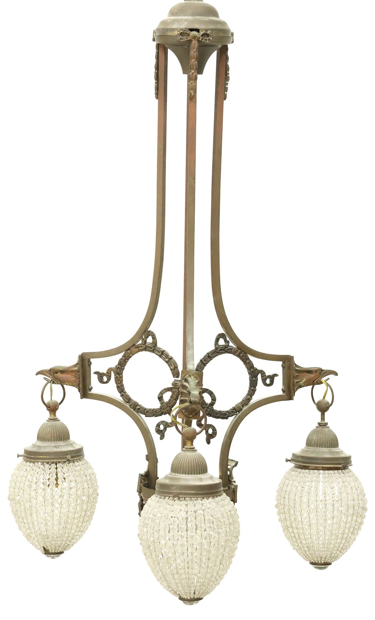 CONTINENTAL PATINATED METAL & BEADED CRYSTAL 3-LIGHT CHANDELIER: Continental patinated metal three-light chandelier, early 20th c., having tripartite frame with wreath motifs and eagle head terminals, supporting beaded crystal shades, terminating on drop finial, in