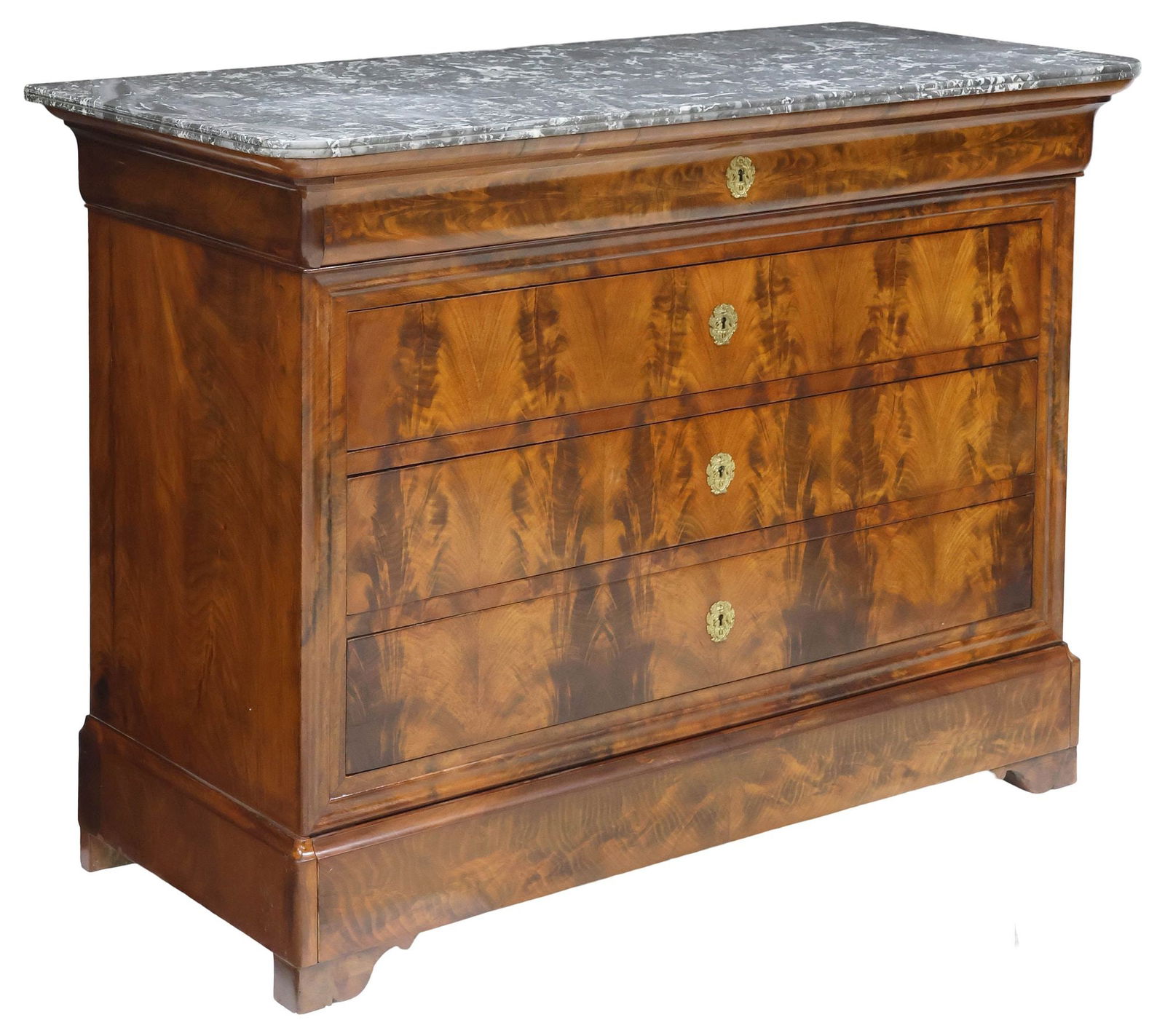 FRENCH LOUIS PHILIPPE PERIOD MARBLE-TOP FLAME MAHOGANY COMMODE: French Louis Philippe flame mahogany commode, mid 19th c., having marble top, over ogee frieze drawer, and three long drawers, the apron concealing an additional drawer, rising on front bracket feet,