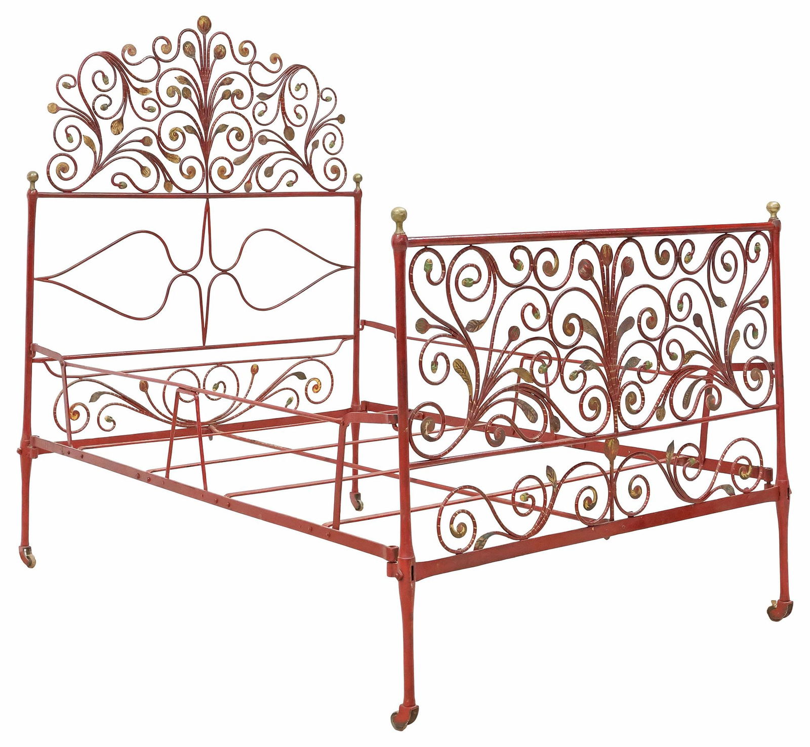 ITALIAN PARCEL-GILT & PAINTED WROUGHT IRON BED: Italian paint-decorated wrought iron bed, late 19th c., in a red-painted finish, with parcel-gilt green-painted foliates and flower buds, having openwork scrolled crest and footboard with brass