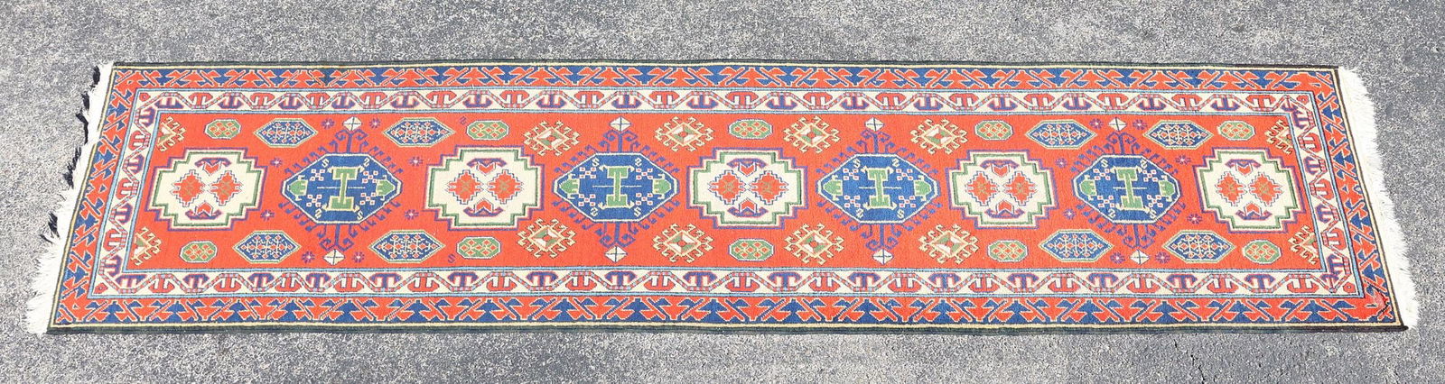 ESTATE HAND-TIED RUNNER, 10'6.5" X 2'7": Estate hand-tied runner, approx 10'6.5"l, 2'7"w **Please Note: All of the rugs offered in this auction would likely benefit from a professional cleaning. Estate rugs may show some wear and