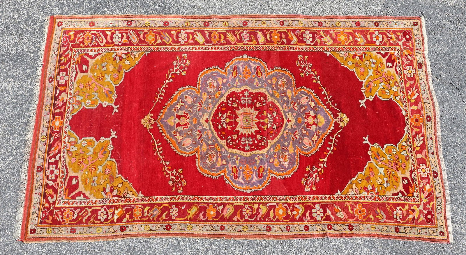ESTATE HAND-TIED RUG, 6'11" X 4'4": Estate hand-tied rug, approx 6'11"l, 4'4"w *Please Note: All of the rugs offered in this auction would likely benefit from a professional cleaning. Estate rugs may show some wear and imperfections.