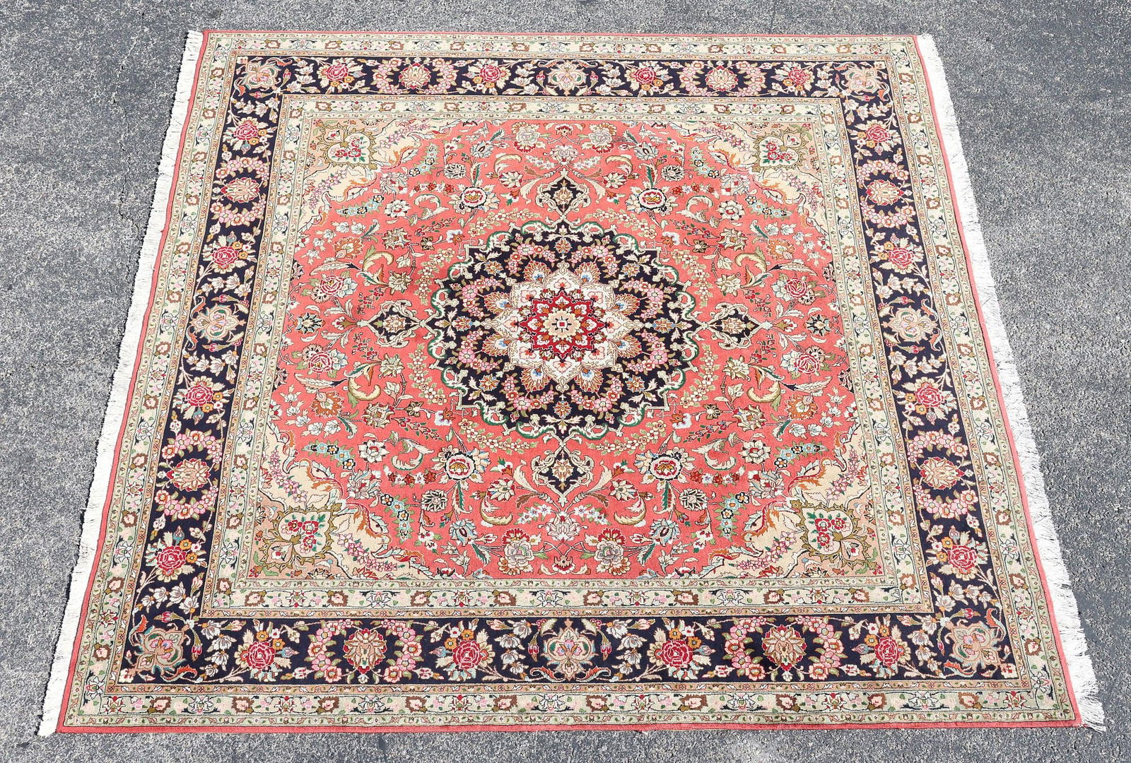 ESTATE HAND-TIED SQUARE RUG, 6'8" X 6'8": Estate hand-tied rug, approx 6'8"l, 6'8"w *Please Note: All of the rugs offered in this auction would likely benefit from a professional cleaning. Estate rugs may show some wear and imperfections.