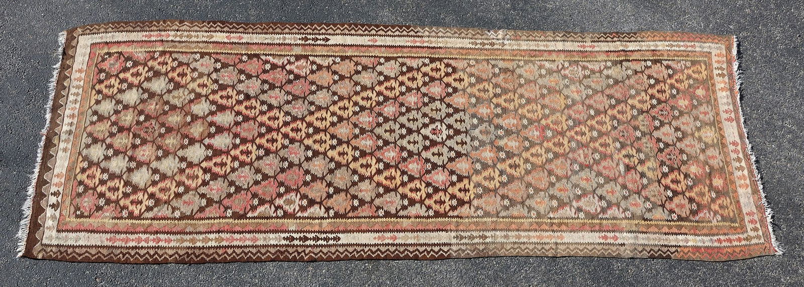 ESTATE FLATWOVEN KILIM RUNNER, 9'10" X 3'10": Estate flatwoven Kilim runner, approx 9'10"l, 3'10"w **Provenance: the Stanley Family's fine Tarrytown Estate** **Please Note: All of the rugs and textiles offered in this auction would likely